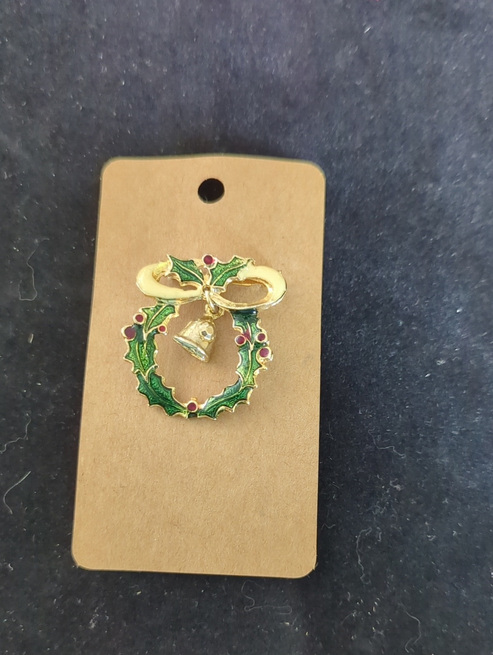 Gold Tone Holly Wreath Brooch with Green Enamel and Red Accents Dangling Bell